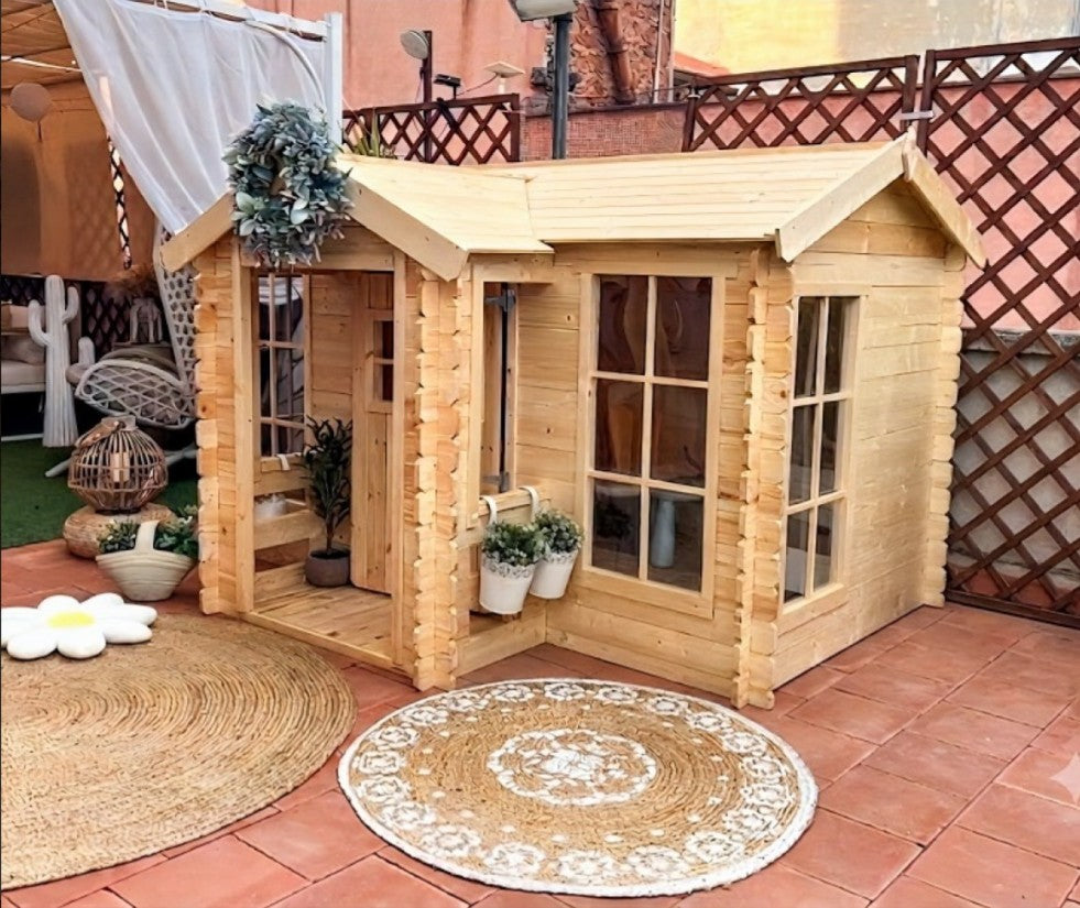 Allwood Isla playhouse in an indoor play area, no shingles needed