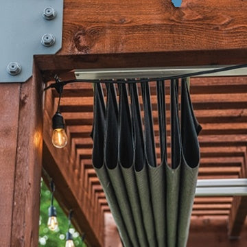 EZ shade canopy system fully retracted on an existing wooden pergola