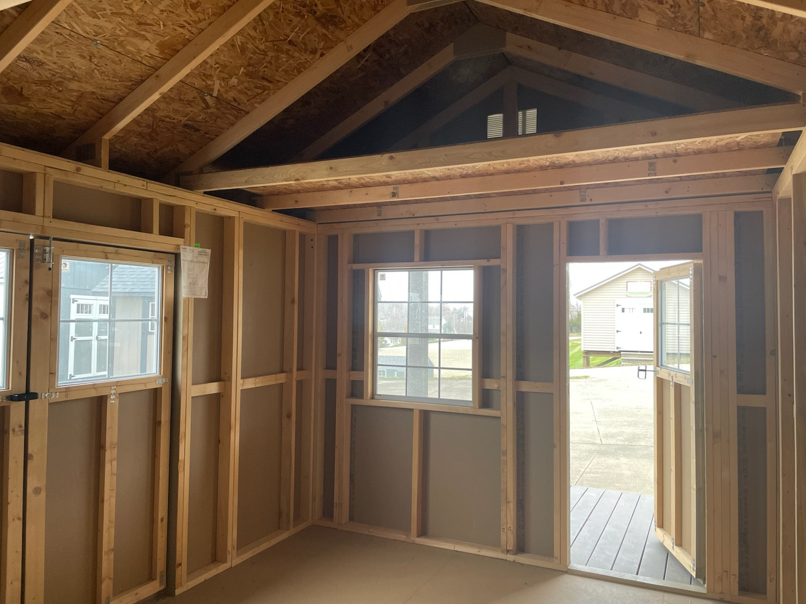 Woodsman Shed with Covered Deck and loft