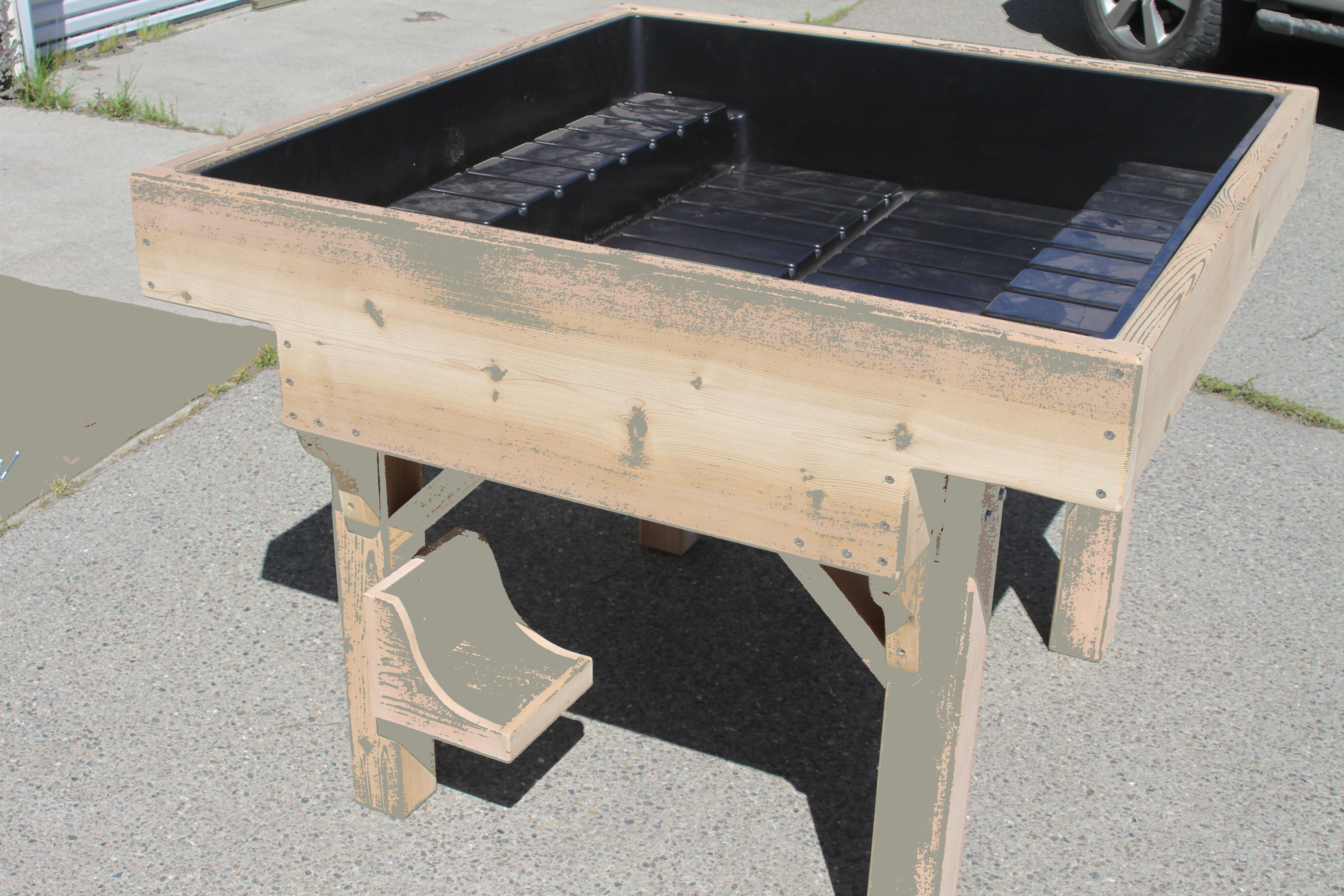 ADA-compliant garden bed side view showing grow tray without wheels