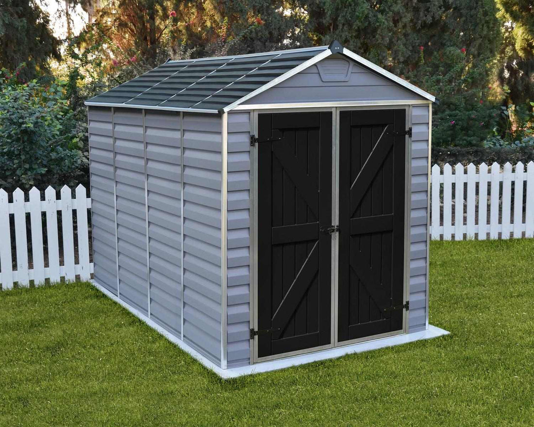 Skylight Storage Shed by Canopia - dark gray deco, near fence