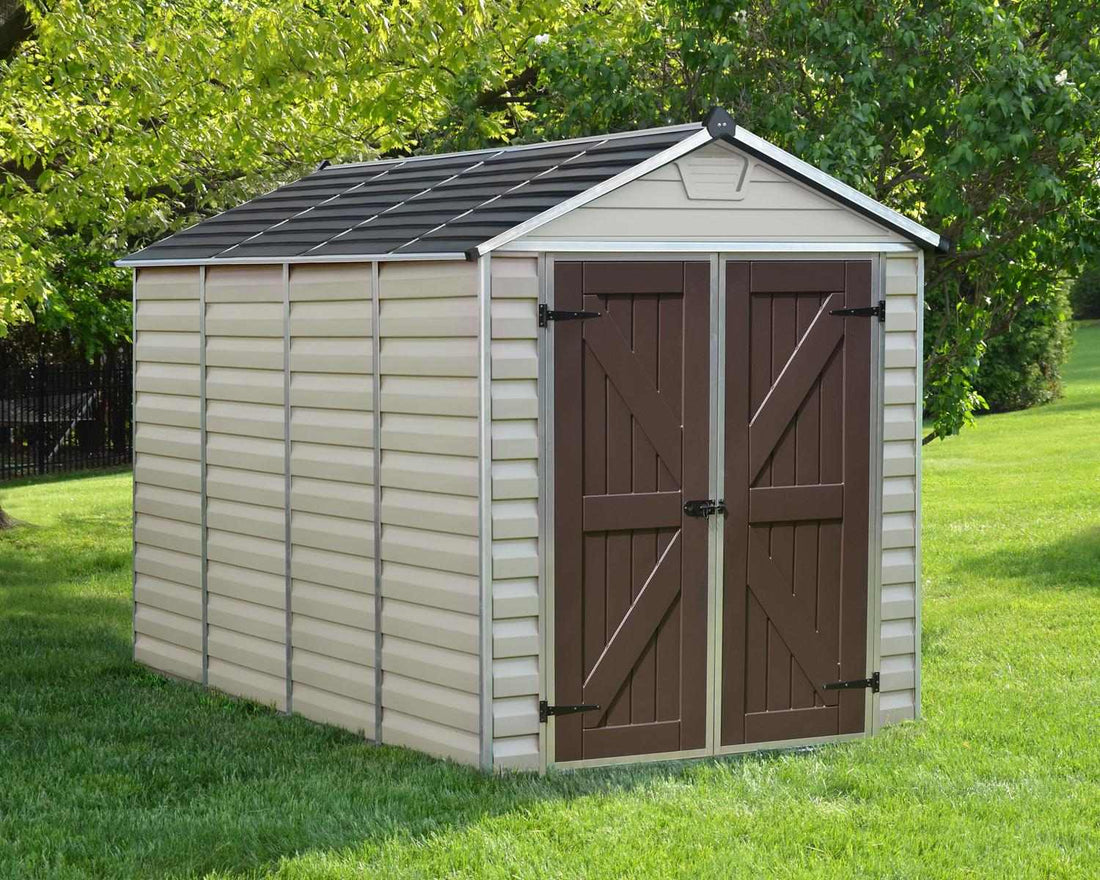 Skylight Storage Shed by Canopia - tan, on lawn