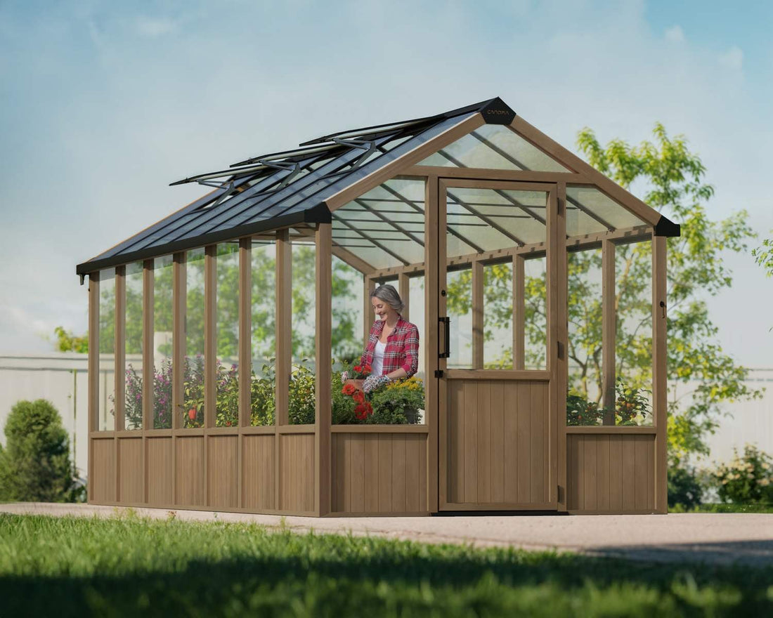 Natura cedar greenhouse installed in garden, main exterior angle