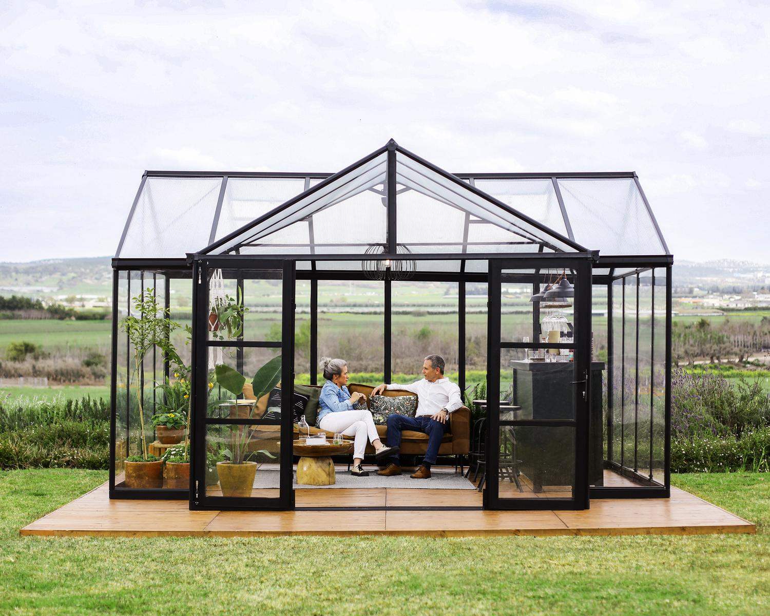 Triomphe Greenhouse by Canopia - outdoor setting