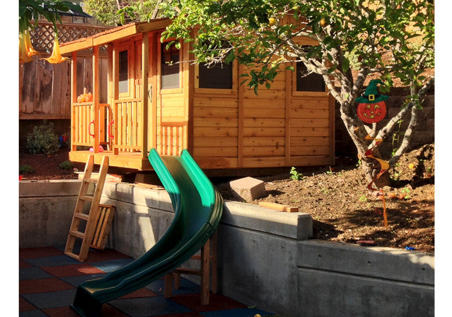 Cozy Cabin Cedar Playhouse porch and sandbox detail