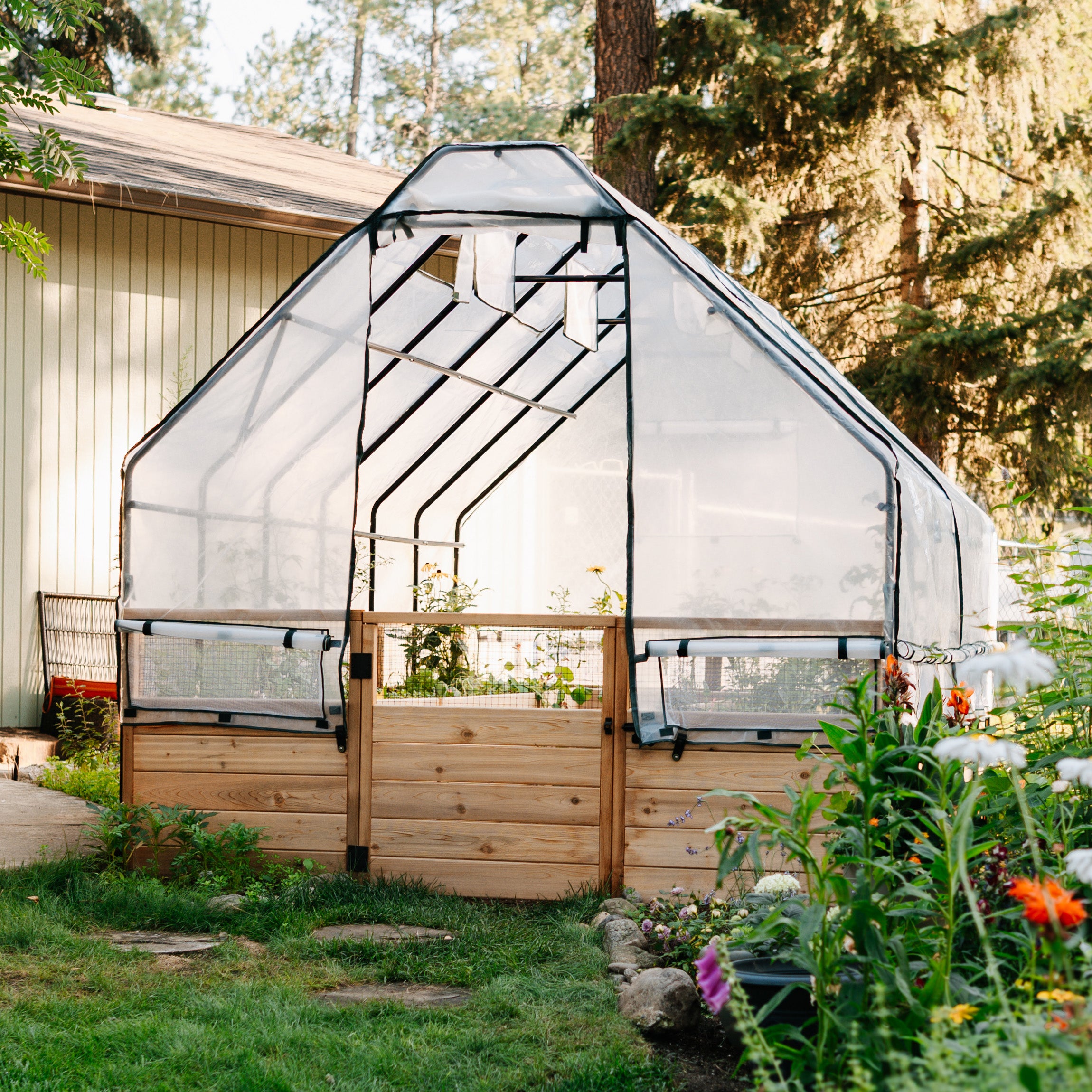 8'x12' raised cedar garden bed with greenhouse cover, elevated front view, alternate angle