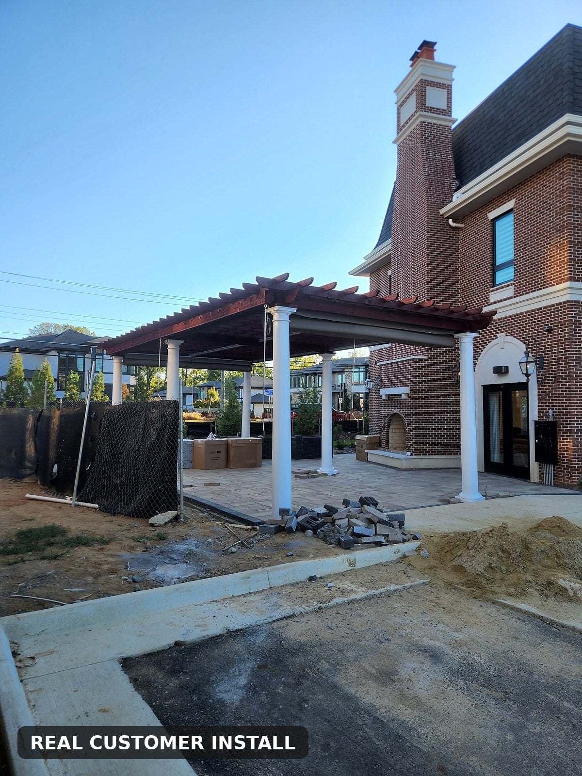 Real customer install — manual triple-track canopy hardware close-up, Chain Bridge Outdoor Solutions