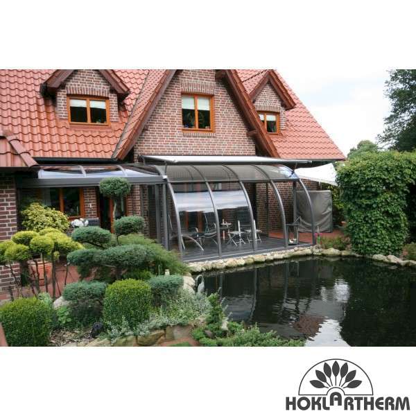 Greenhouse garden room curved front glide open smoothly creating a breezy, open-air patio cover 