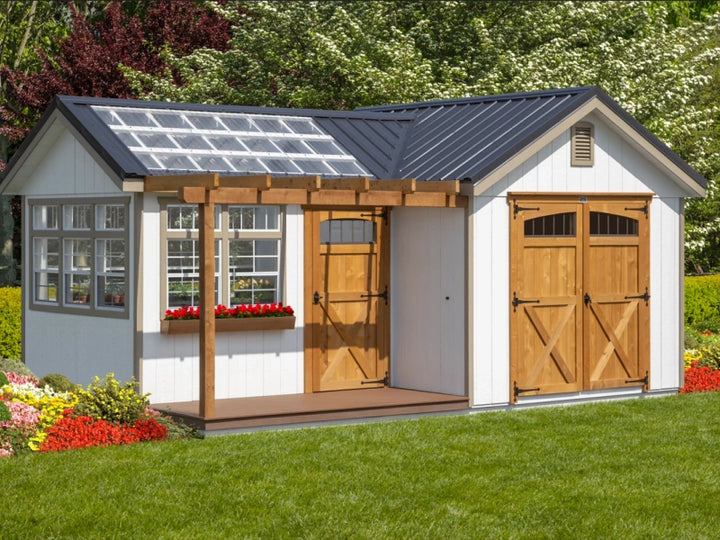 Greenhouse shed combo with cedar pergola and door and metal roof with polycarbonate panels
