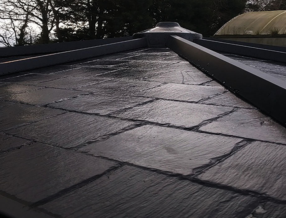 Close-up of Nordic Garden room roof with black waterproofing membrane.