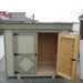 Trash Can Shed Kit with door open showing bin access